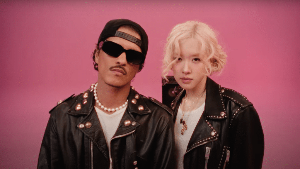 Still shot of "APT." music video by Bruno Mars (left) and ROSÉ (right.)