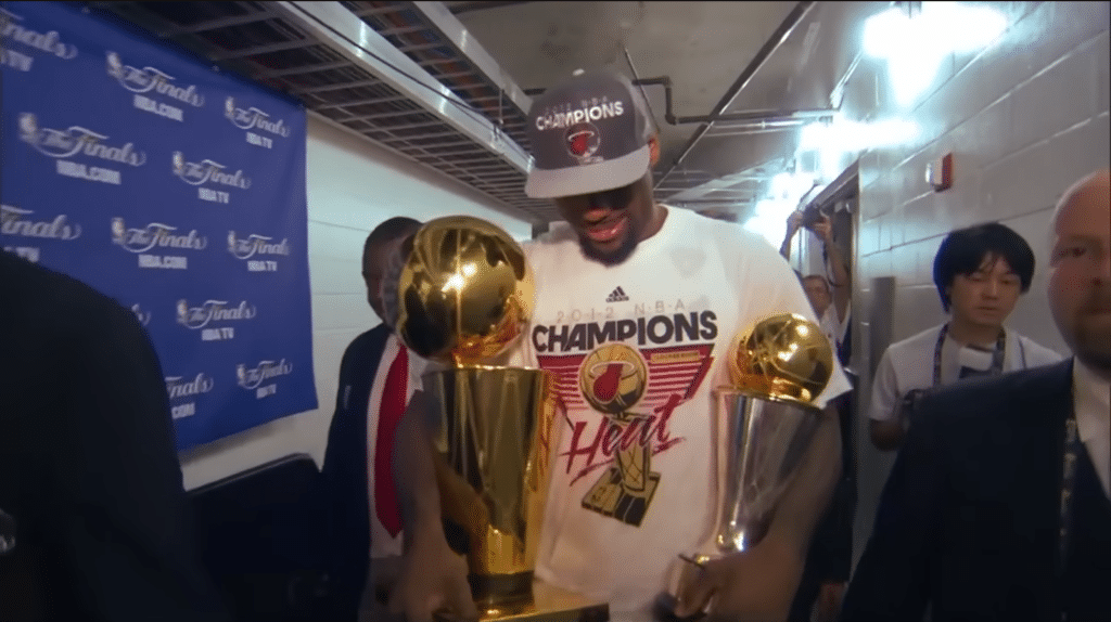LeBron James celebrates winning his first NBA championship with the Miami Heat in 2012.