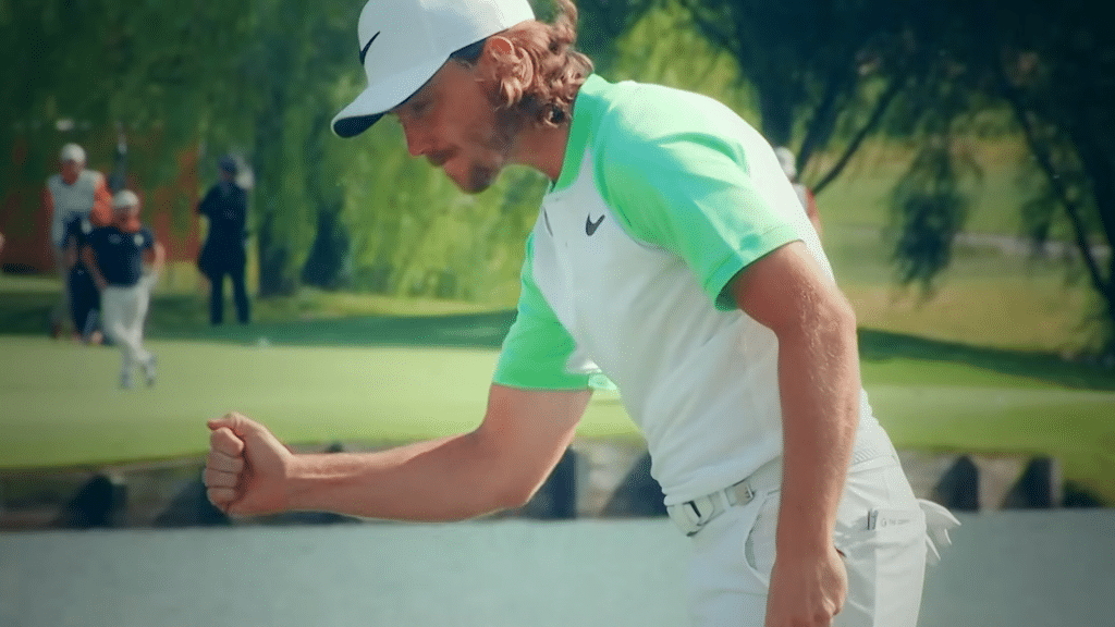 Fleetwood gives a fist bump after draining a winning putt.