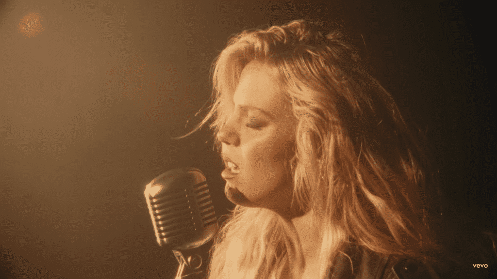 Reneé Rapp in the 'Why Is She Still Here?' music video