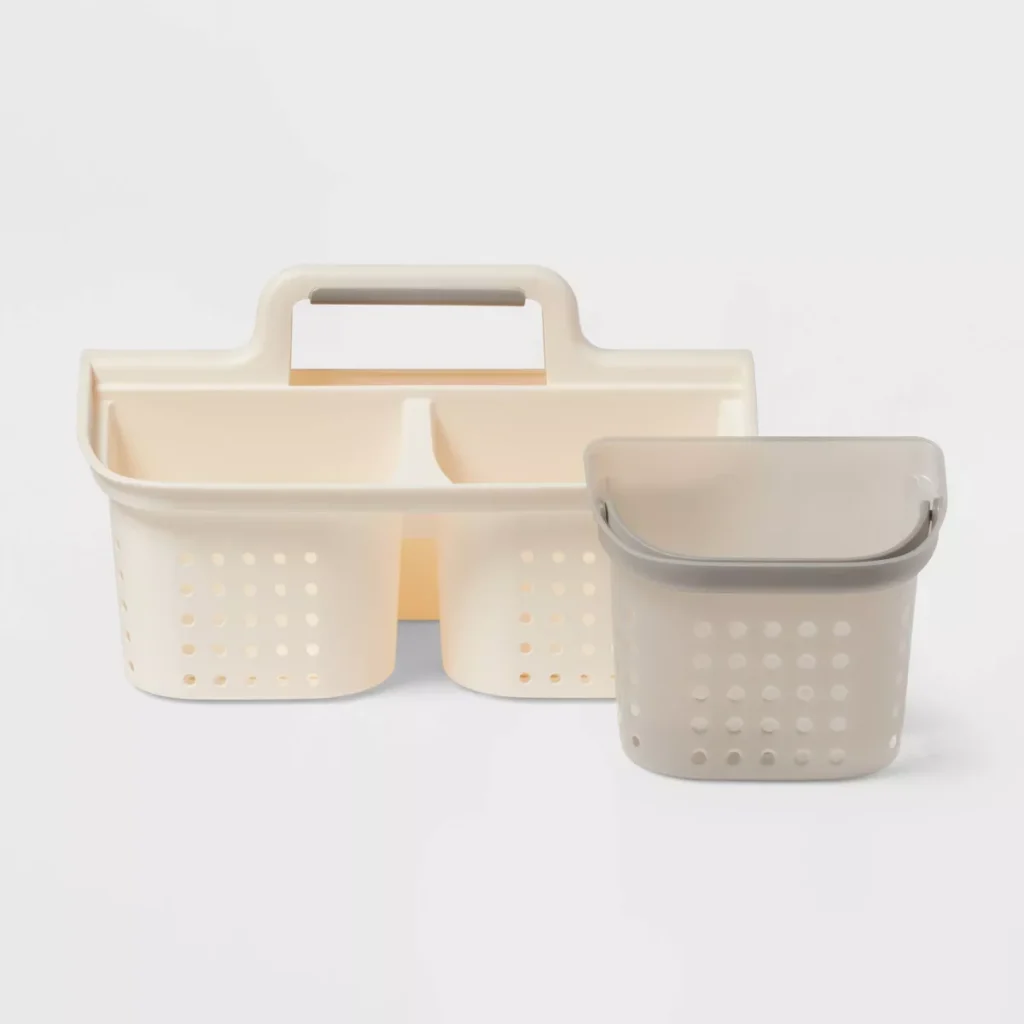 Large beige shower caddy pictured next to smaller gray shower caddy.