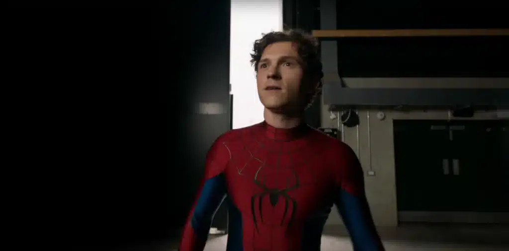 Tom Holland as Spider-Man looking behind the camera.