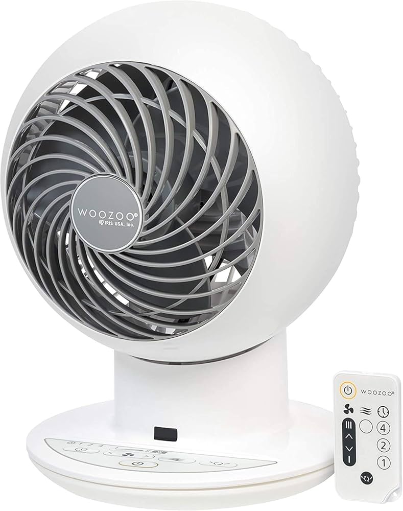 Small fan and its remote control to sit on a dorm desk.