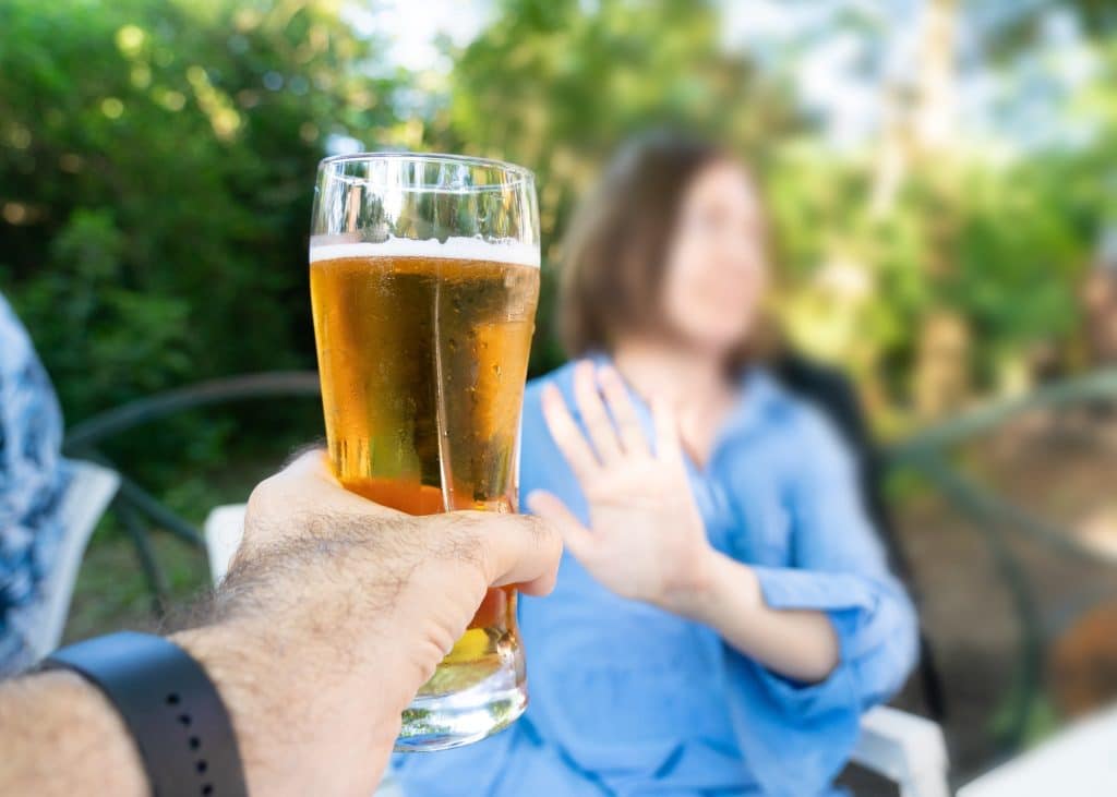 Someone saying no to a beer