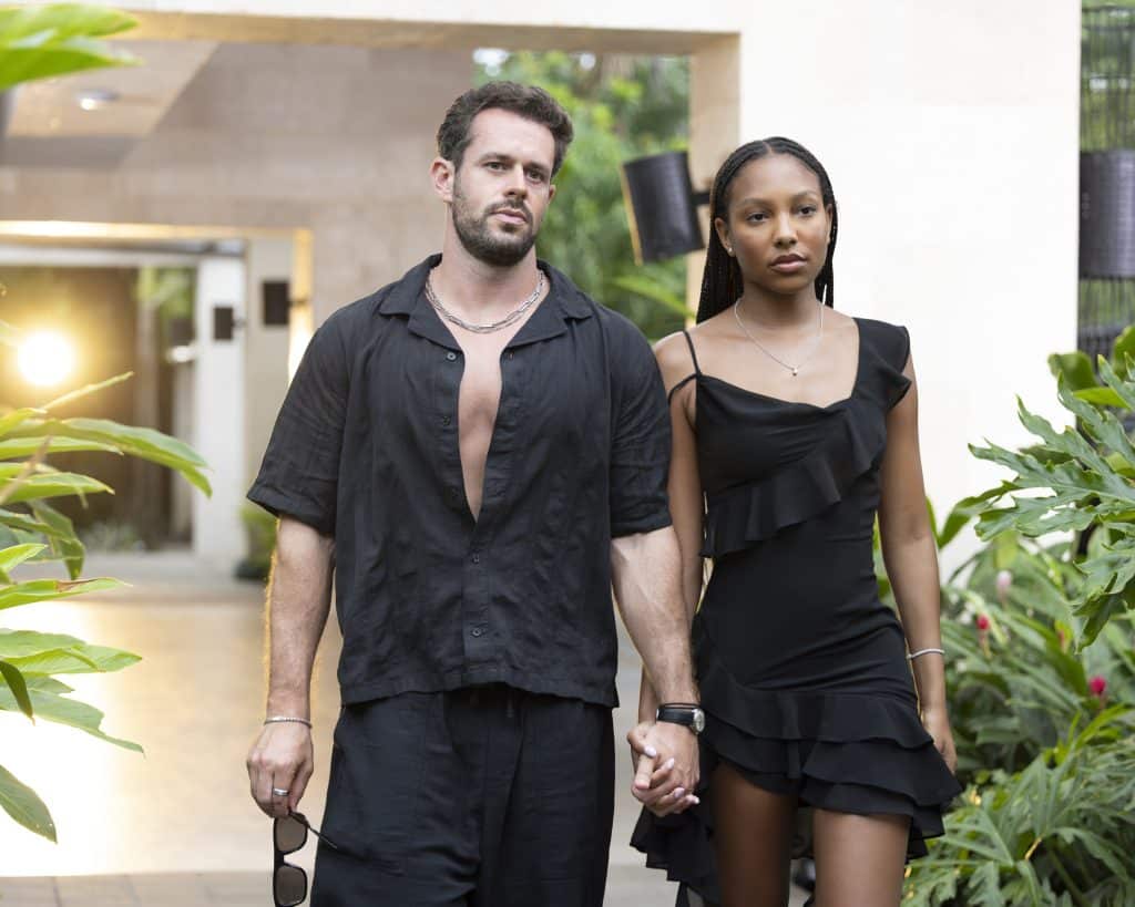 Jeremy and Bailey walking hand in hand
