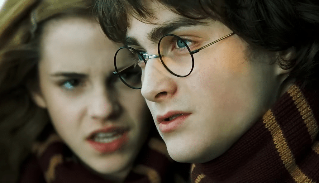 Hermione looking at Harry.