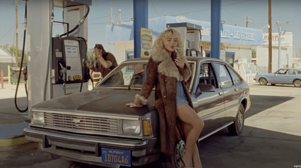 Still shot of Sabrina Carpenter in "Manchild" music video.
