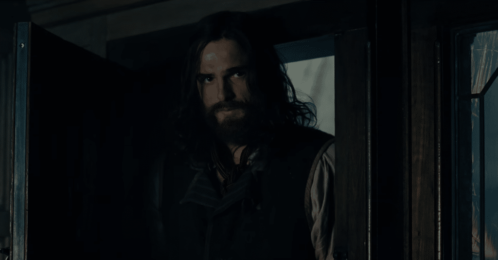 Heathcliff enters through a dark doorway