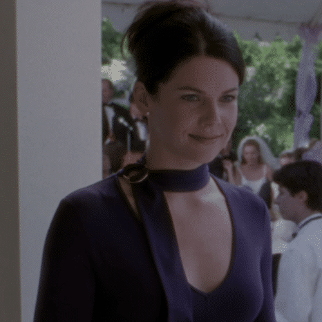 Lorelai in a purple outfit.