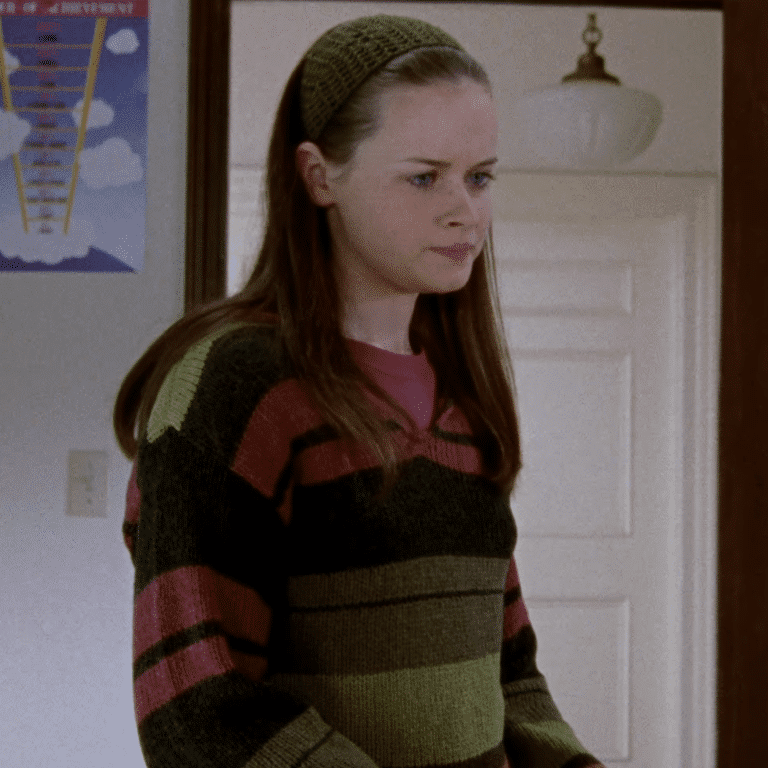 Rory in a striped sweater.