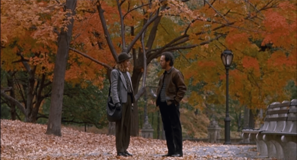 A man and a woman in a park