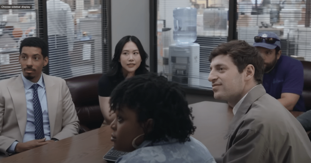 Cast of 'The Paper' in a reporter's meeting.