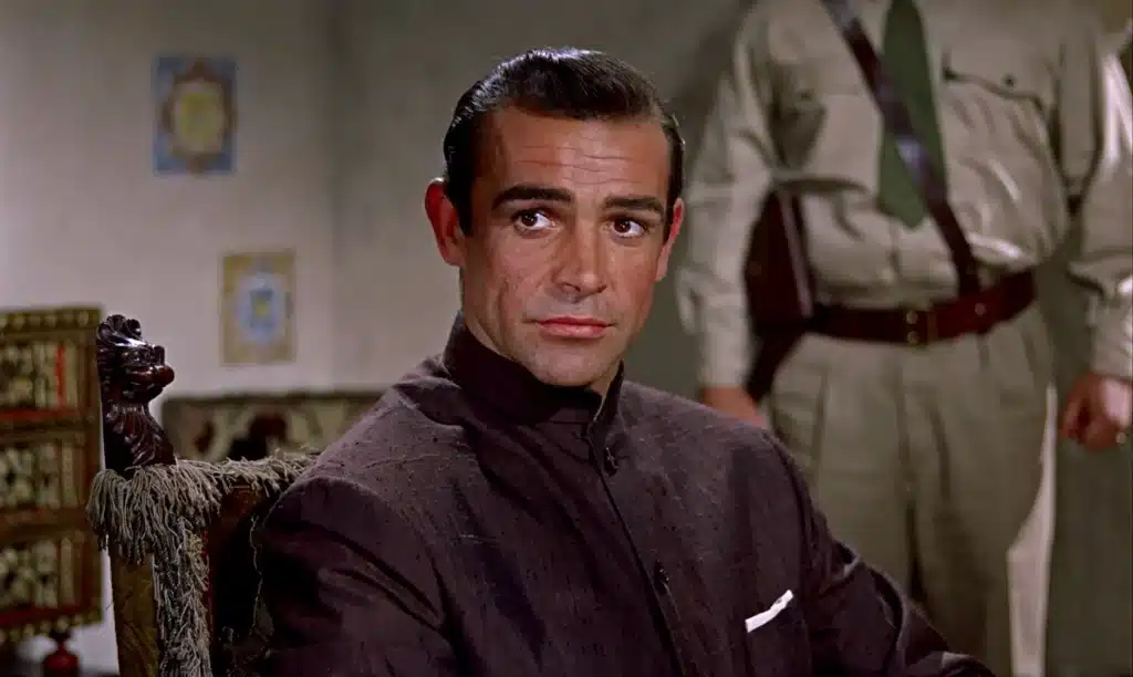 A rare non-tux moment in "Dr. No". (Image: Eon Productions).