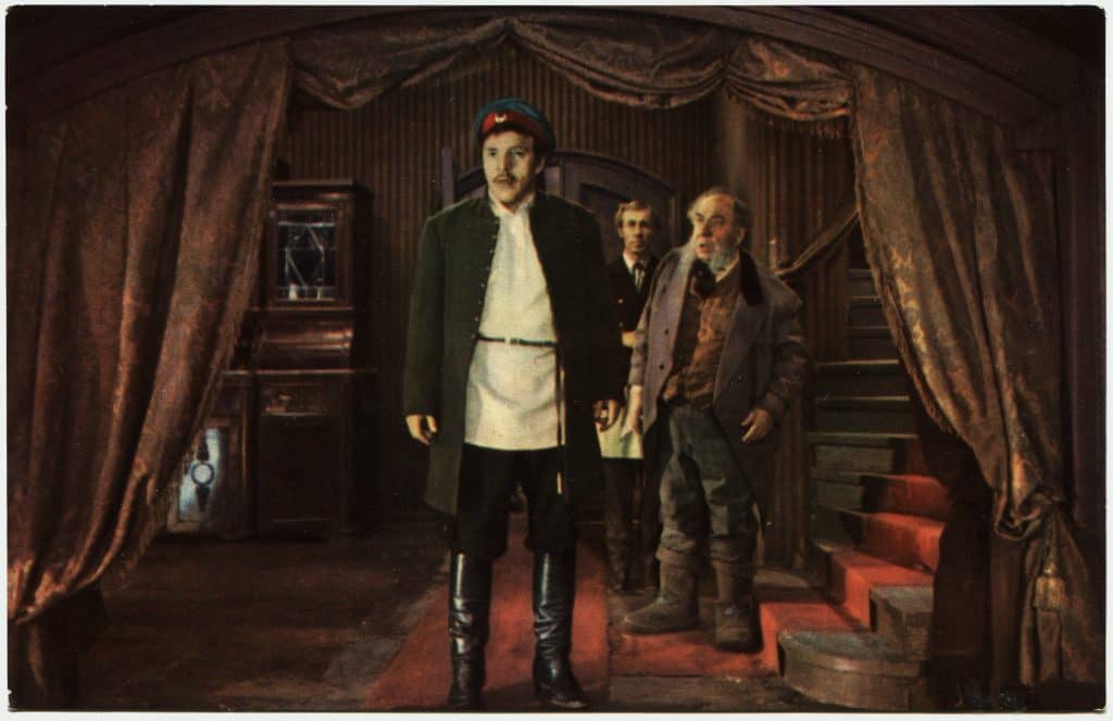 Postcard printed in the USSR shows shot of 3 men from the film 'The Brothers Karamazov,' with actor Mikhail Ulyanov, circa 1969.