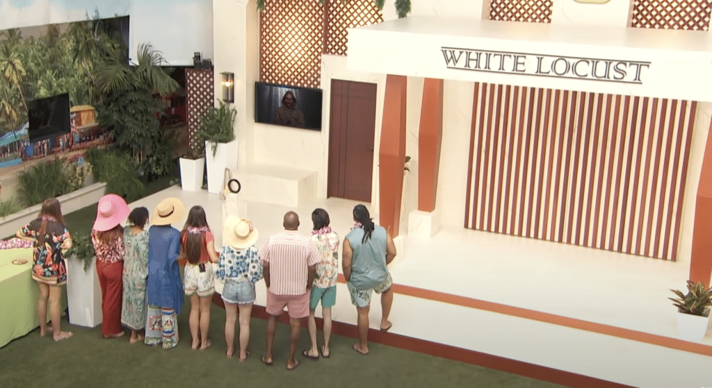 Houseguests watch as the 'White Locust' twist is introduced
