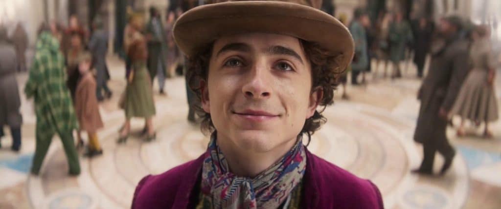 Wonka looking happily towards the zoomed in camera