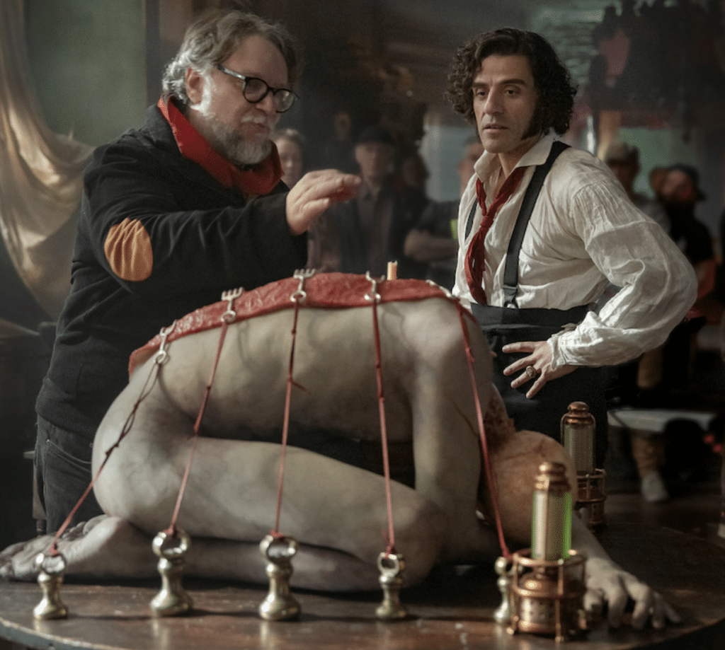 Guillermo Del Toro directing Oscar Isaac on the set.