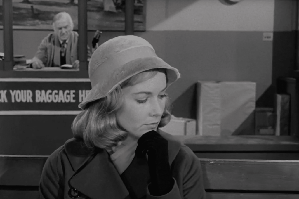 Milicent Barnes (Vera Miles) at the bus station.