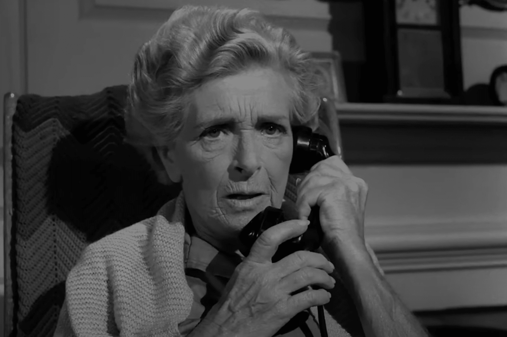 Miss Keene on the telephone.