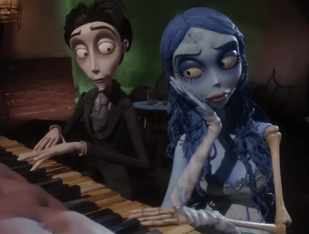 Victor trying to get Emily to play the piano with him. Credit: YouTube/VyrovCZ