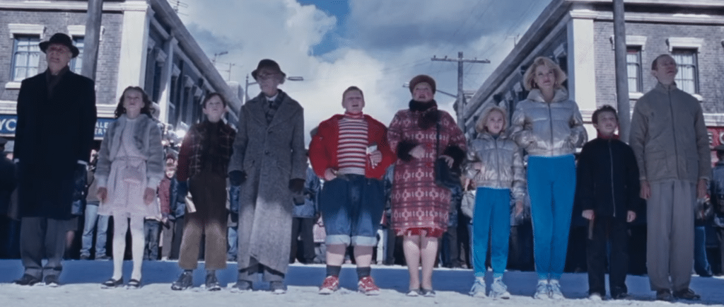 The golden ticket winners and their parents waiting to enter Mr. Wonka's chocolate factory. Credit: YouTube/TealAndGreenKnife