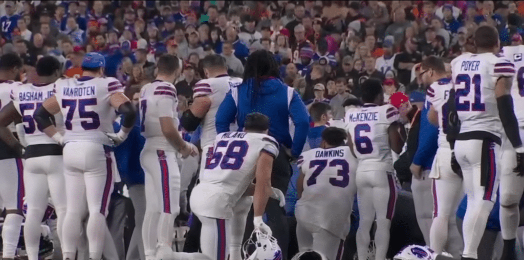 Bills players kneeling in solidarity in support of Hamlin