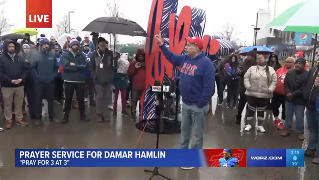 Fans gather for a prayer service honoring Damar Hamlin