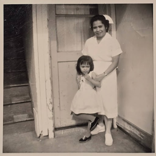 Sesiang Rufo in her nursing uniform with daughter, Araceli Rufo (1960s)