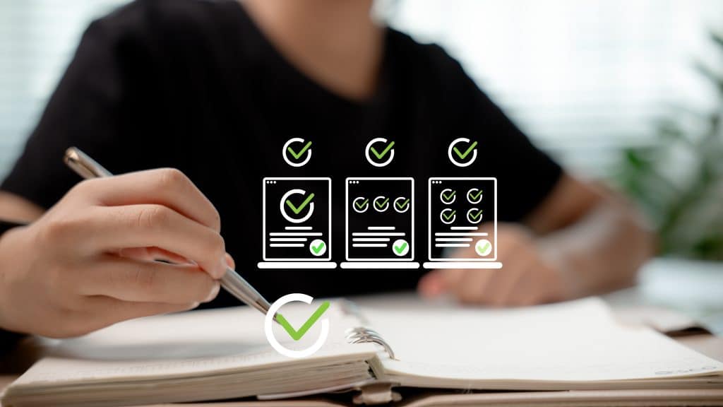 A person holding a pen writes something down, while virtual to-do items are ticked off on the book.
