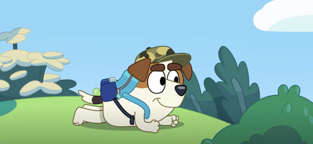 A canon ADHD character: Jack Russell, who is alert during sentry duty while playing Army with Rusty, displaying hyperfixation during play time.