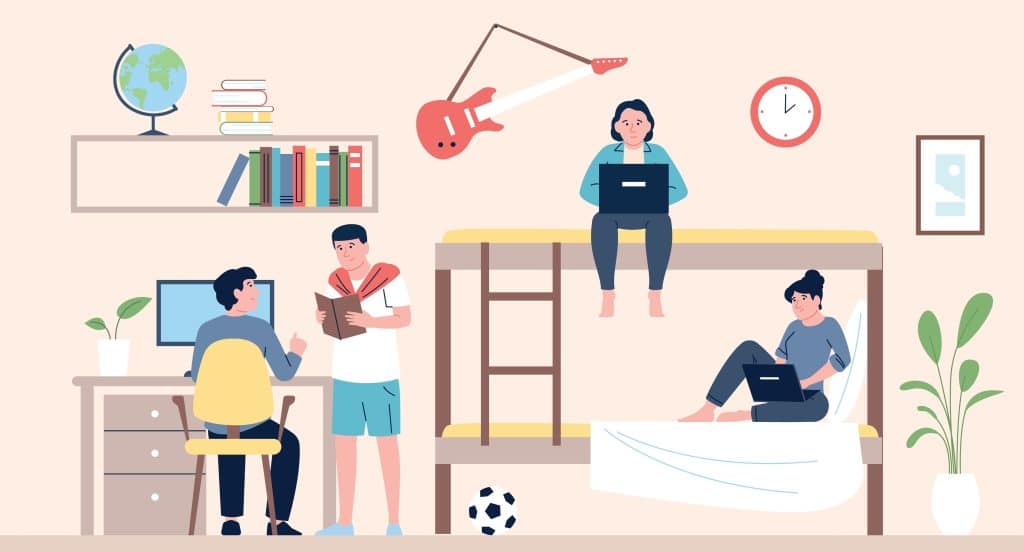 A group of friends hanging out in their dorm (Shutterstock)