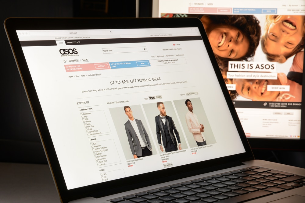 A laptop showing the Asos website, it is on the men's fashion page.