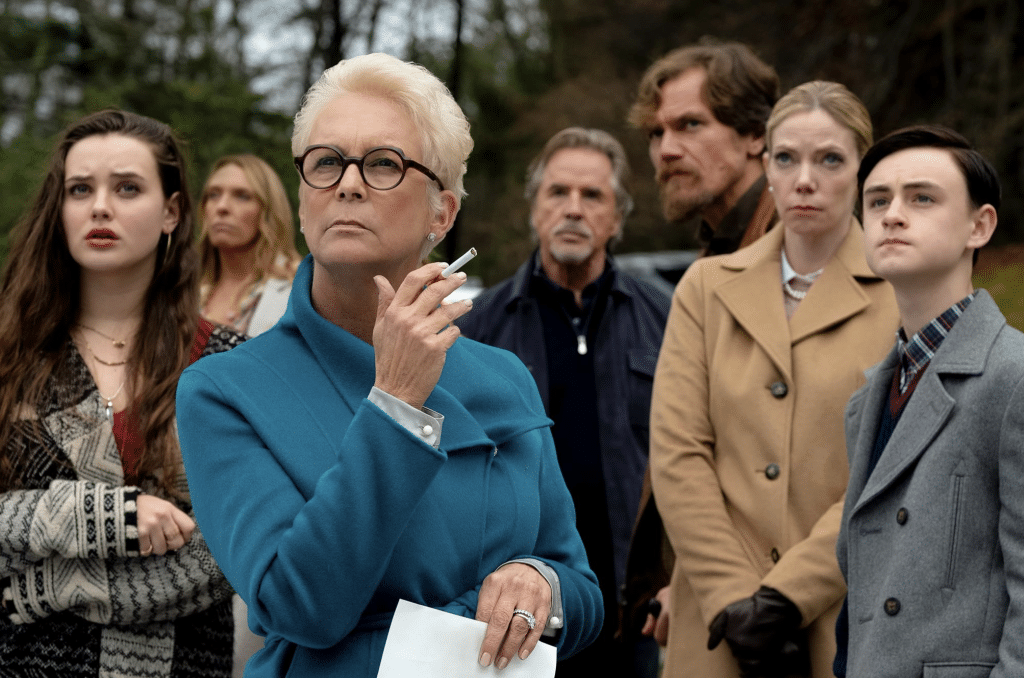 The cast of characters peers off screen.