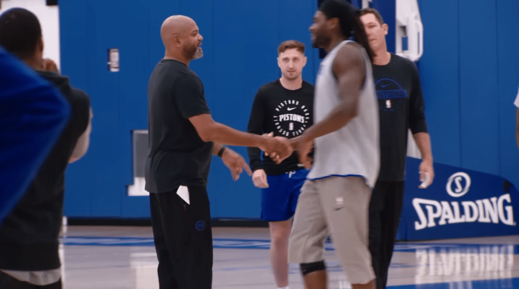 Head Coach J.B. Bickerstaff working with the Pistons’ roster, emphasizing discipline and teamwork.