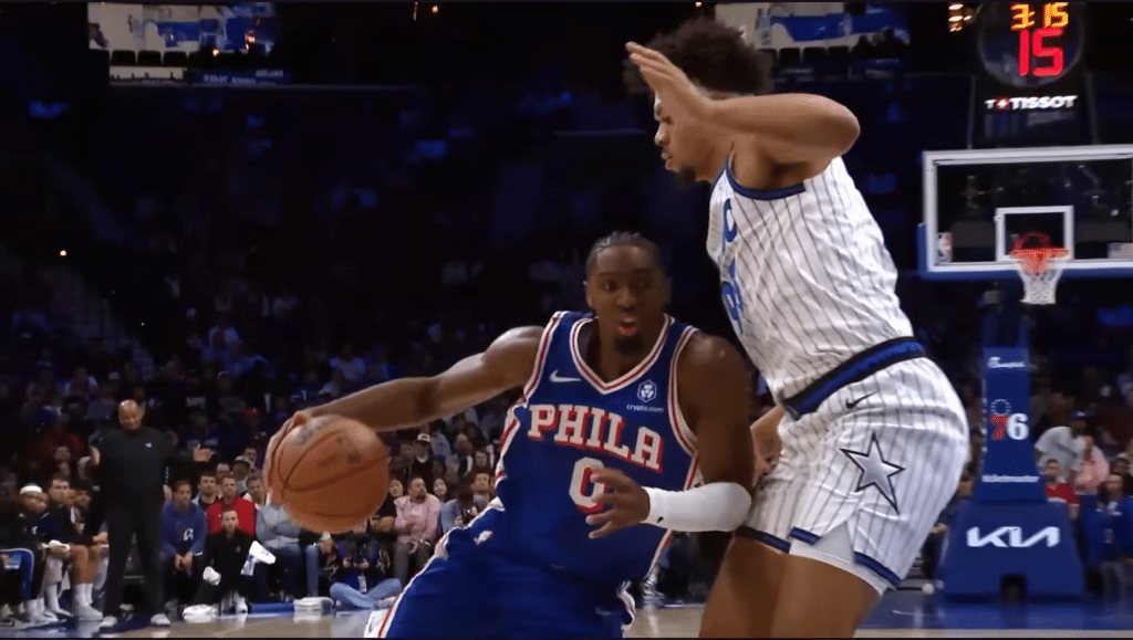 Tyrese Maxey attacking the rim against Orlando, carrying the Sixers offense early in the season.