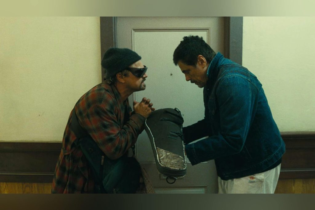 Leonardo DiCaprio and Benicio del Toro share a moment of courage (Warner Bros. Pictures)