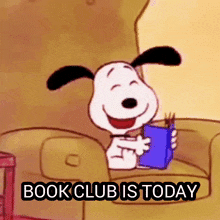 Snoopy reading a booka