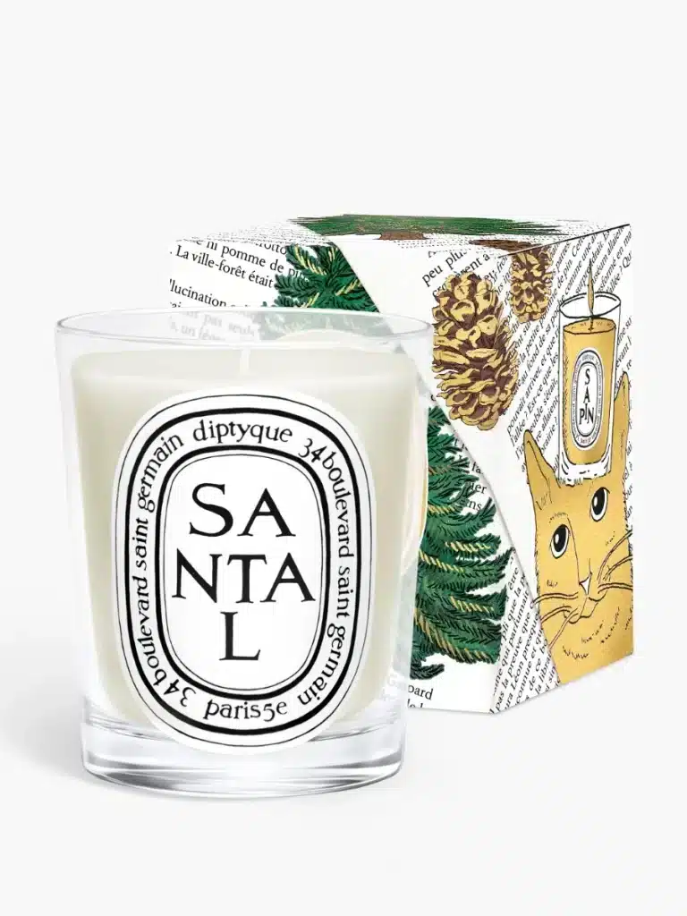santal candle with holiday packaging