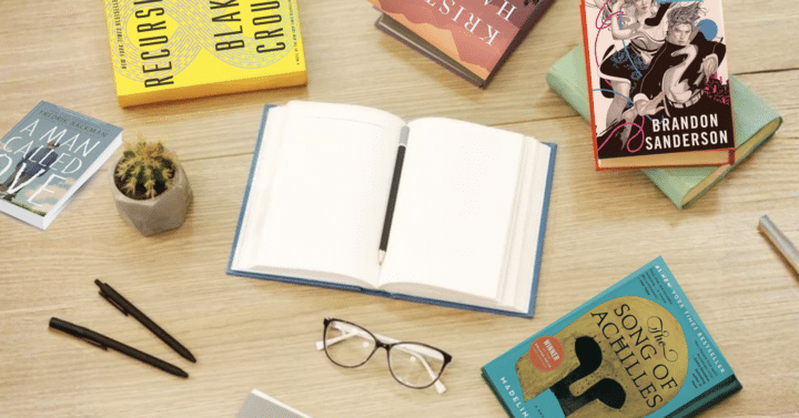 Book club books mentioned in article on a desk with trinkets