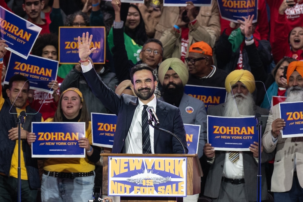 Zohran Mamdani speaking at an event.