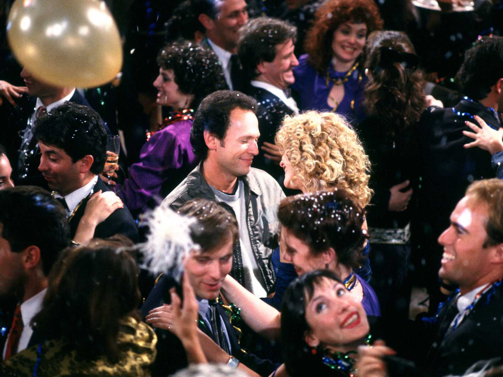 Harry and Sally share a New Year's Eve kiss.