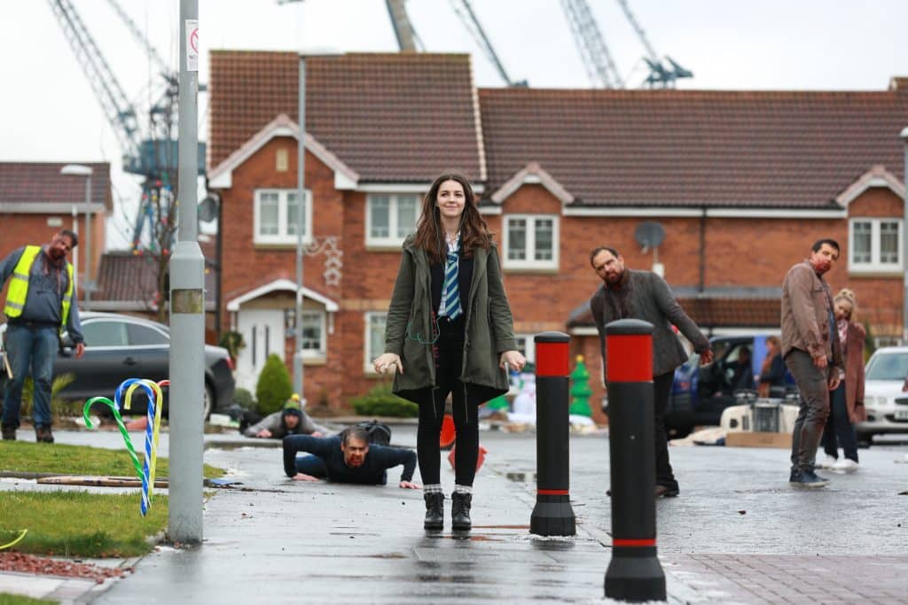 Anna (Ella Hunt) oblivious to the apocalypse around her.