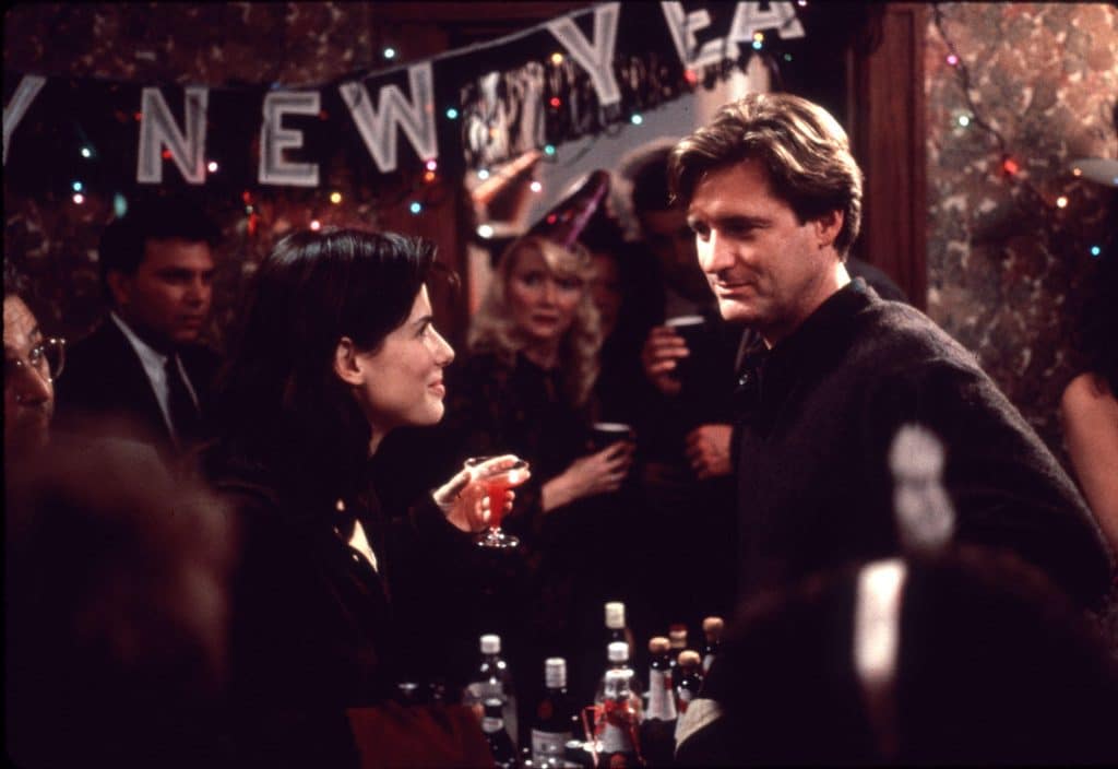 Sandra Bullock as Lucy and Jack played by Bill Pullman in While You Were Sleeping (1995)