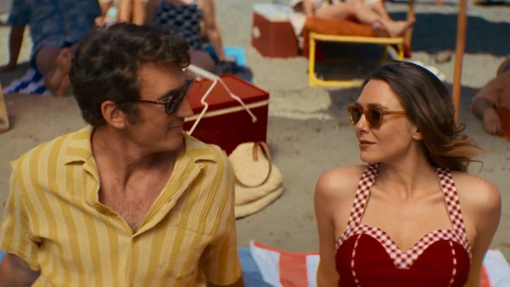 Larry and Joan lounge at the beach. (A24)