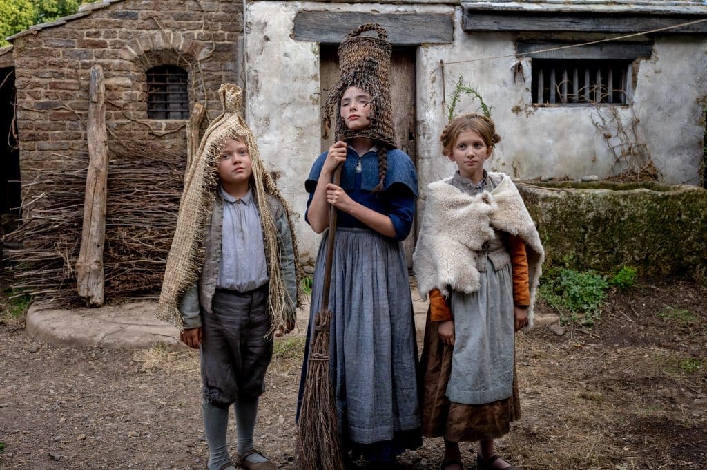 Jacobi Jupe, Bodhi Rae Breathnach, and Olivia Lynes as the young Shakespeare's. (Focus Features)