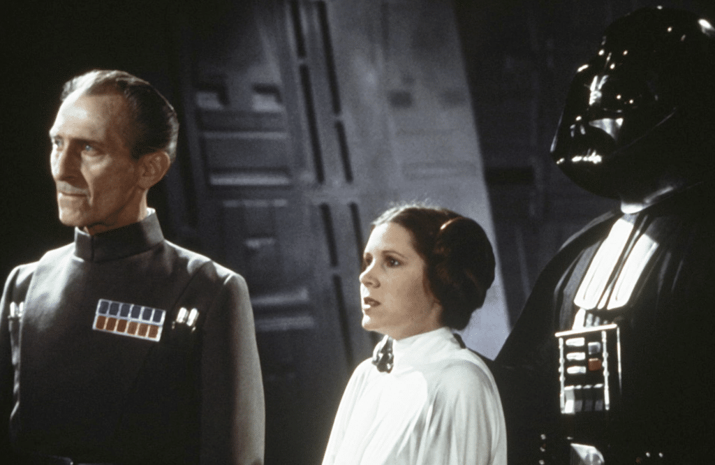 Darth Vader, Princess Leia, and the General stand together