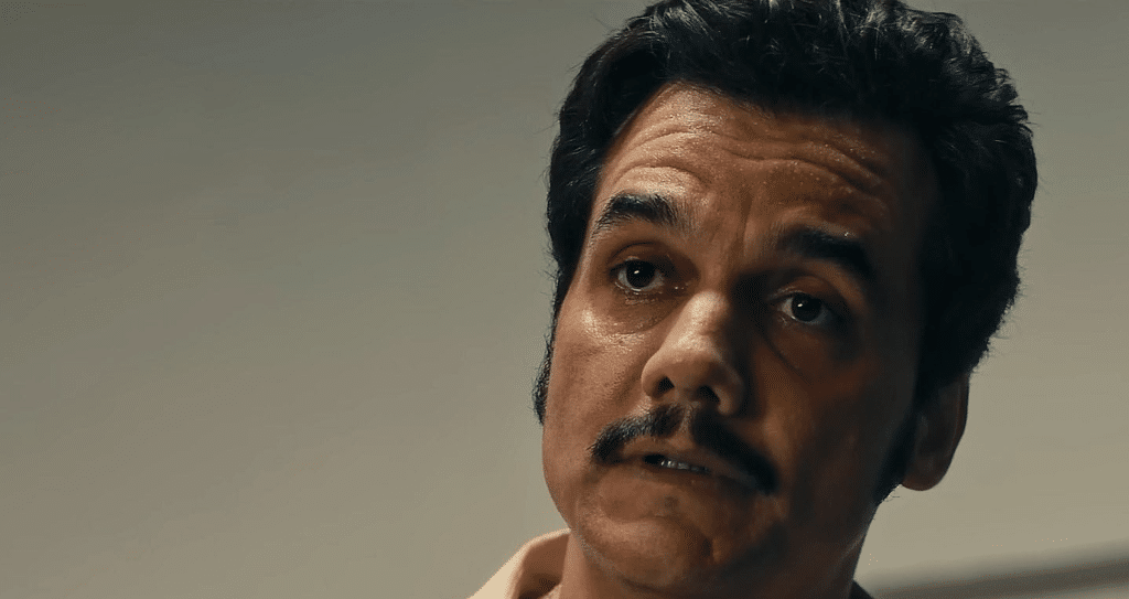 Wagner Moura sports a stylish 70s mustache and sideburns combo. Credit: NEON.