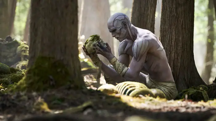 Jacob Elordi as Frankenstein's Creation, exploring nature. (Credit: Google)