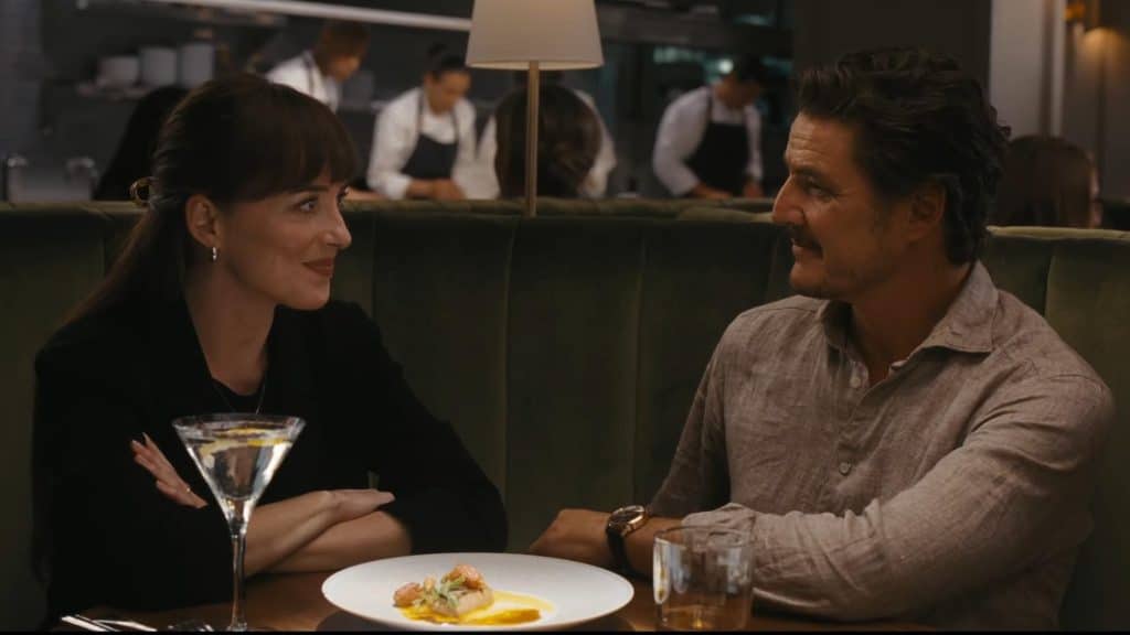 Dakota Johnson and Pedro Pascal in "Materialists." (Credit: A24)