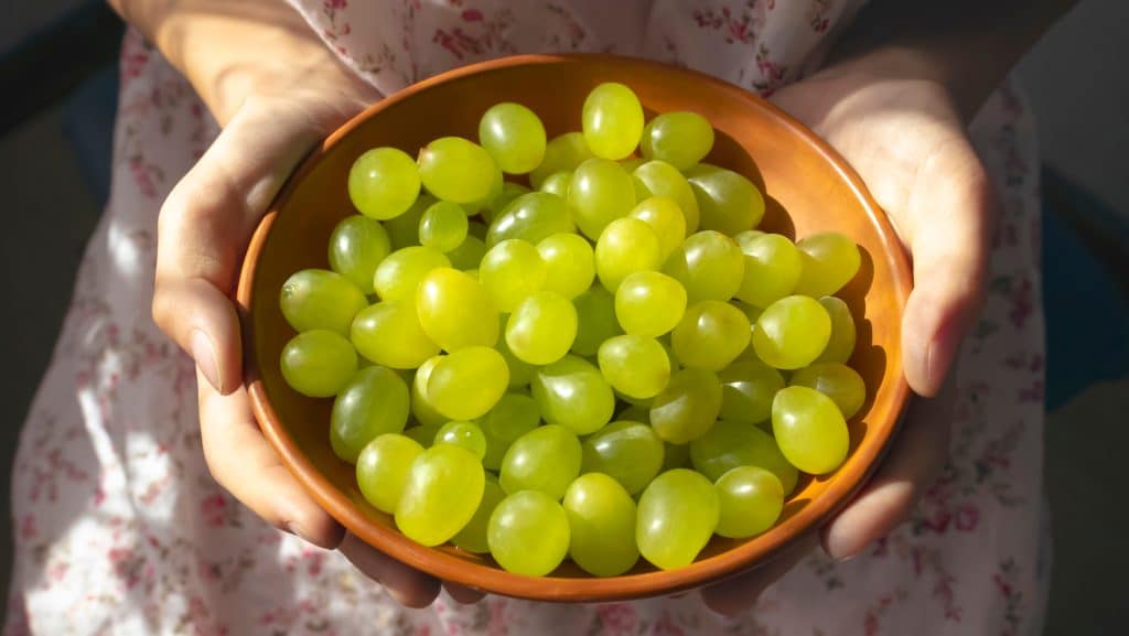 Do green grapes really have the power to grant me love and prosperity? // Credit: Anna Polina / Shutterstock